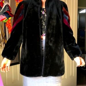 Black fur coat with colored lines on sleeves Large